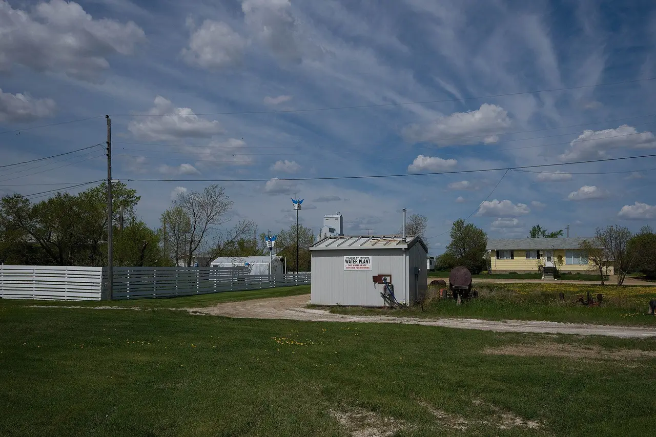 Water plant and houses under a big sky, 2009